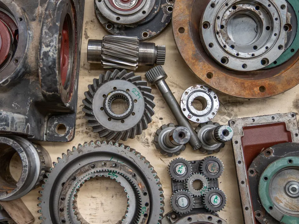 Machined metal components and gears in a workshop