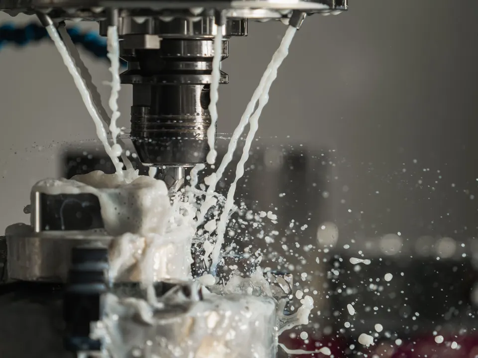 Close-up of an industrial CNC lathe in a machine shop
